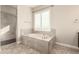 Bathroom with soaking tub and walk-in shower at 26918 N 7Th Ln, Phoenix, AZ 85085