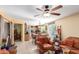 Living room with open concept to kitchen and dining area at 2260 W Mineral Butte Dr, San Tan Valley, AZ 85144