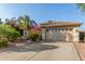 One-story home with a two-car garage and desert landscaping at 2260 W Mineral Butte Dr, San Tan Valley, AZ 85144