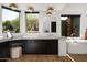 Spa-like bathroom with freestanding tub, marble vanity, and large windows at 10184 E Peak Cir, Scottsdale, AZ 85262