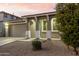 Charming single story home with arched entryway and attached garage at 20442 E Rosa Rd, Queen Creek, AZ 85142
