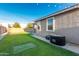 Backyard oasis with hot tub and putting green at 20442 E Rosa Rd, Queen Creek, AZ 85142