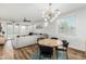 Dining area with a round table and view into living room at 20442 E Rosa Rd, Queen Creek, AZ 85142
