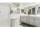 Elegant bathroom with dual vanities, a large shower, and marble flooring at 20442 E Rosa Rd, Queen Creek, AZ 85142