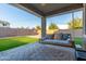 Relaxing backyard with covered patio and swing bed at 20442 E Rosa Rd, Queen Creek, AZ 85142