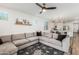 Open concept living room with a view into the kitchen and dining area at 20442 E Rosa Rd, Queen Creek, AZ 85142