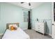 bedroom with a twin bed, dresser, and playful decor at 20442 E Rosa Rd, Queen Creek, AZ 85142