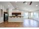 Open kitchen with island, stainless steel appliances, and granite countertops at 2448 E Fiesta Dr, Casa Grande, AZ 85194