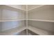 Spacious pantry with ample shelving for storage at 2448 E Fiesta Dr, Casa Grande, AZ 85194