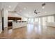 Open kitchen with island, dark wood cabinets, and tile flooring at 2448 E Fiesta Dr, Casa Grande, AZ 85194