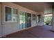 Covered patio with multiple windows and sliding glass doors at 2448 E Fiesta Dr, Casa Grande, AZ 85194