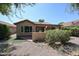 Backyard view of house showcasing patio and landscaping at 2448 E Fiesta Dr, Casa Grande, AZ 85194