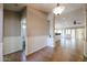 Bright and spacious entryway with tile flooring, leading to kitchen and living areas at 2448 E Fiesta Dr, Casa Grande, AZ 85194