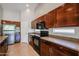 Kitchen with stainless steel appliances and wood cabinets at 2448 E Fiesta Dr, Casa Grande, AZ 85194