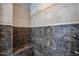 Shower with tiled walls and a built-in seat at 2448 E Fiesta Dr, Casa Grande, AZ 85194