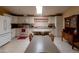 Spacious kitchen with white cabinets and an island at 11596 W Sierra Dawn Blvd # 36, Surprise, AZ 85378