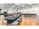 Large community room with tables and chairs for events at 11596 W Sierra Dawn Blvd # 36, Surprise, AZ 85378
