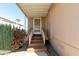 Wooden steps leading to the entrance of the mobile home at 11596 W Sierra Dawn Blvd # 36, Surprise, AZ 85378