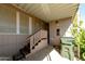 Side entrance with stairs and a trash can at 11596 W Sierra Dawn Blvd # 36, Surprise, AZ 85378