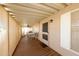 Covered patio with wooden deck and outdoor dining set at 11596 W Sierra Dawn Blvd # 36, Surprise, AZ 85378