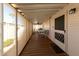 Covered patio with wooden deck and outdoor dining set at 11596 W Sierra Dawn Blvd # 36, Surprise, AZ 85378