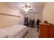 Small bedroom with a twin bed and workspace at 11596 W Sierra Dawn Blvd # 36, Surprise, AZ 85378