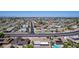 Wide aerial view of neighborhood with houses and streets at 9821 N 103Rd Ave, Sun City, AZ 85351