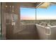 Spa-like shower with glass enclosure and stunning city views at 7201 N 23Rd Pl, Phoenix, AZ 85020