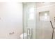 Modern bathroom with glass shower and built-in shelves at 30600 N Pima Rd # 58, Scottsdale, AZ 85266