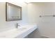 Simple bathroom with vanity, mirror, and towel bar at 30600 N Pima Rd # 58, Scottsdale, AZ 85266