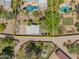 Bird's-eye view of the house and expansive backyard, including a pool and additional structures at 3731 E Equestrian Trl, Phoenix, AZ 85044