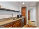 Small kitchen with granite counters and stainless steel appliances at 207 W Clarendon Ave # 20B, Phoenix, AZ 85013