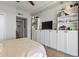Bedroom with built-in shelves and storage at 207 W Clarendon Ave # 20B, Phoenix, AZ 85013