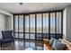 Living room with large windows and city views at 207 W Clarendon Ave # 20B, Phoenix, AZ 85013