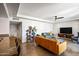 Open concept living room with kitchen and city views at 207 W Clarendon Ave # 20B, Phoenix, AZ 85013