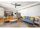 Living room with two sofas, a coffee table and a kitchenette at 207 W Clarendon Ave # 20B, Phoenix, AZ 85013