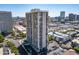High-rise building aerial view, showing surrounding city landscape and parking at 207 W Clarendon Ave # 20B, Phoenix, AZ 85013