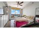 Bedroom with city views and built-in storage at 207 W Clarendon Ave # 20B, Phoenix, AZ 85013