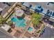 Complex with pool, patio, and parking at 207 W Clarendon Ave # 20B, Phoenix, AZ 85013