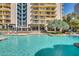 Large pool with multiple seating areas at 207 W Clarendon Ave # 20B, Phoenix, AZ 85013