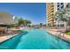 Inviting swimming pool with surrounding patio at 207 W Clarendon Ave # 20B, Phoenix, AZ 85013