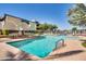 Refreshing blue pool with lounge chairs at 207 W Clarendon Ave # 20B, Phoenix, AZ 85013