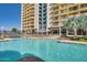 Resort-style pool with building in background at 207 W Clarendon Ave # 20B, Phoenix, AZ 85013