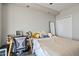 Bedroom with a bed, desk and built-in storage at 207 W Clarendon Ave # 20B, Phoenix, AZ 85013
