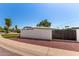 House exterior with a modern gate and wall at 8717 E Thornwood Dr, Scottsdale, AZ 85251