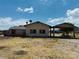 Ranch-style home with carport and large backyard at 51631 W Turney Ln, Maricopa, AZ 85139