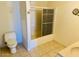 Bathroom with shower/tub combo and tile flooring at 51631 W Turney Ln, Maricopa, AZ 85139