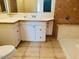 Bathroom featuring vanity with drawers and tile flooring at 51631 W Turney Ln, Maricopa, AZ 85139