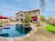 Stunning kidney shaped pool with a large backyard at 40626 N Laurel Valley Way, Anthem, AZ 85086