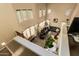 High-ceiling living room viewed from the second floor at 40626 N Laurel Valley Way, Anthem, AZ 85086